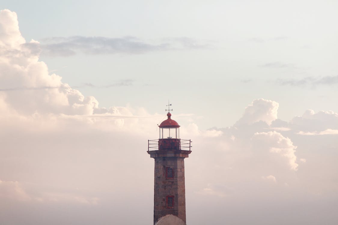Selective Focus Photography Of Lighthouse