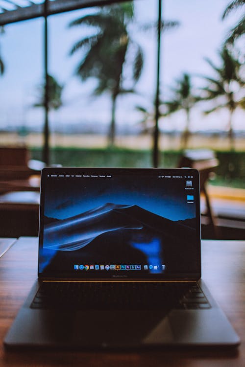 Free Black Laptop Computer Turned on Stock Photo