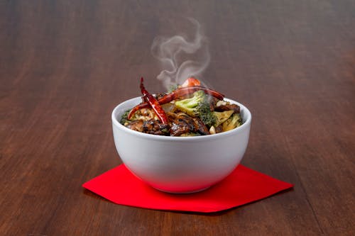 Free A bowl of food with smoke coming out of it Stock Photo