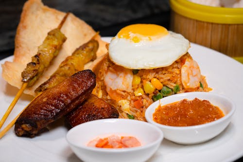 Free A plate with rice, meat and an egg Stock Photo