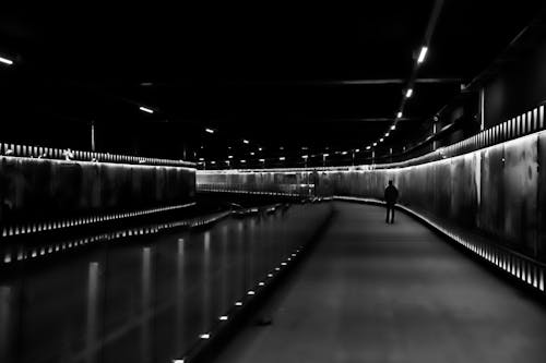 A black and white photo of a tunnel