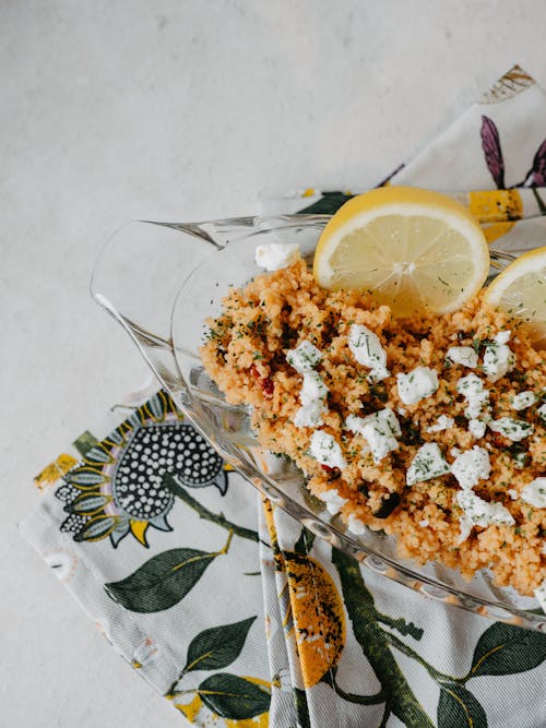 Couscous with Lemon and Cheese on Table