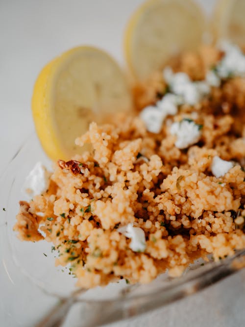 Close-up of Delicious Homemade Couscous with Cheese and Lemon