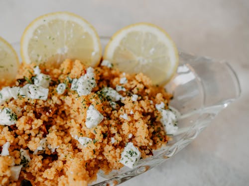 Homemade Couscous with Cheese and Lemon on Plate