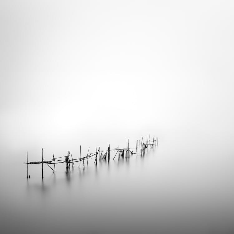 Fog Over Fishing Net On Lake