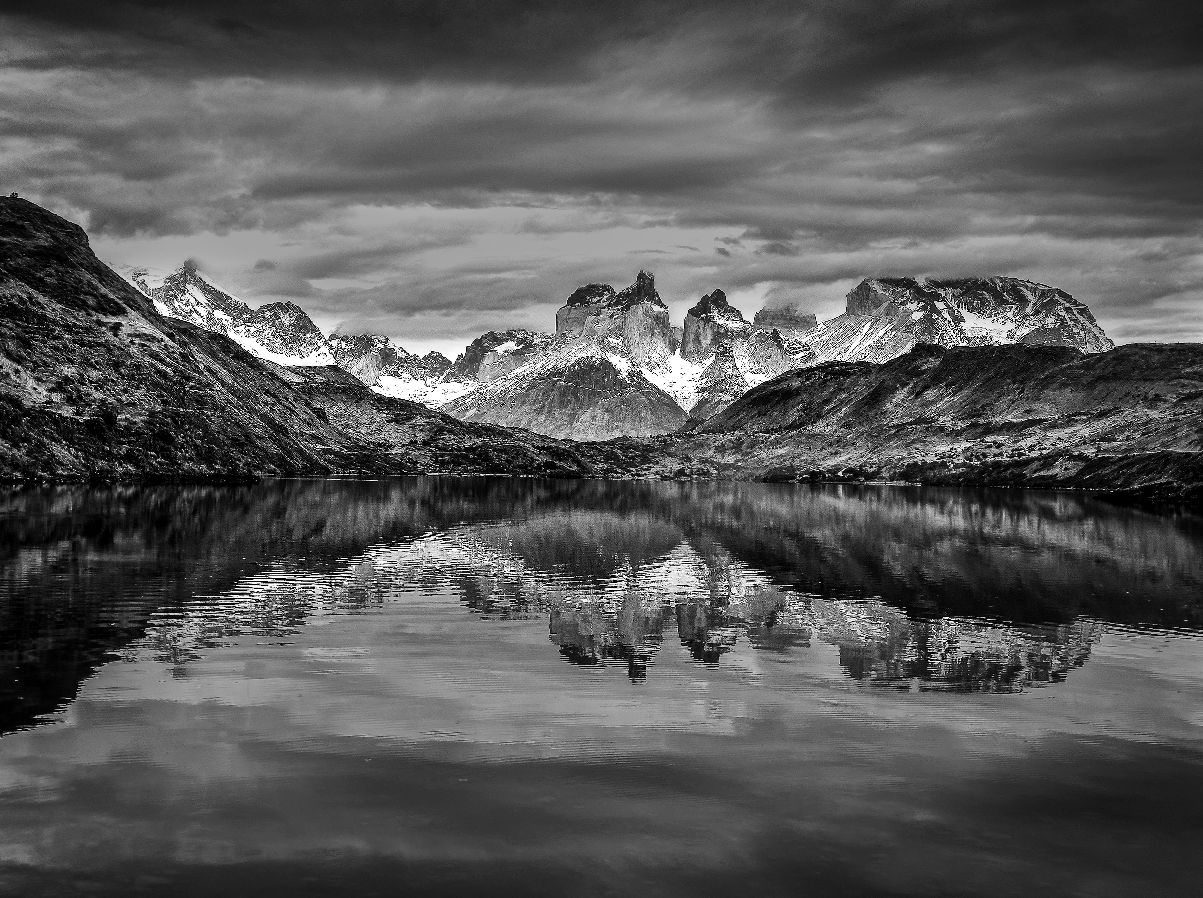 Clouds over Lake and Mountains in Black and White · Free Stock Photo