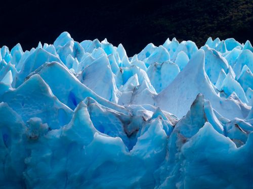 Free Stunning blue icy peaks of the Perito Moreno Glacier in Santa Cruz, Argentina. Stock Photo