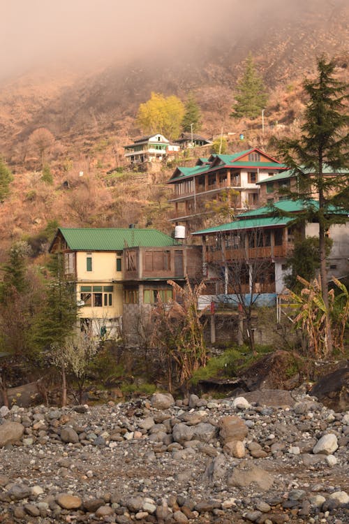 Buildings in a Mountain Valley in Fall