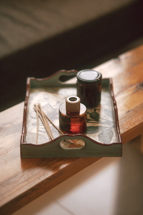 Free A tray with two bottles of essential oils on it Stock Photo