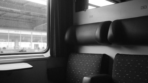 Free Elegant view of a train cabin with window in black and white style. Stock Photo