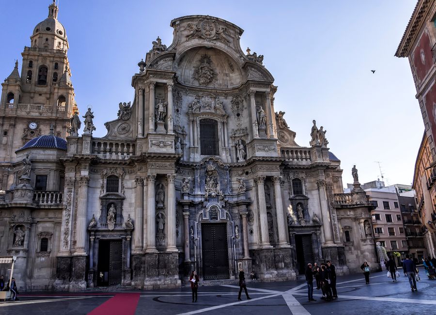 Capture of the intricate facade of the Murcia Cathedral in Spain, showcasing stunning baroque architecture.