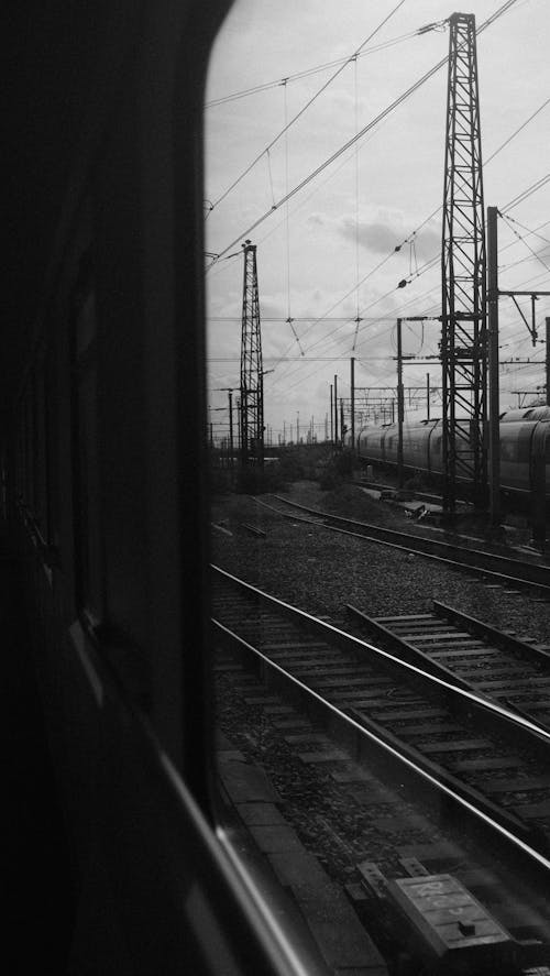 Foto profissional grátis de estrada de ferro, faixas, janela