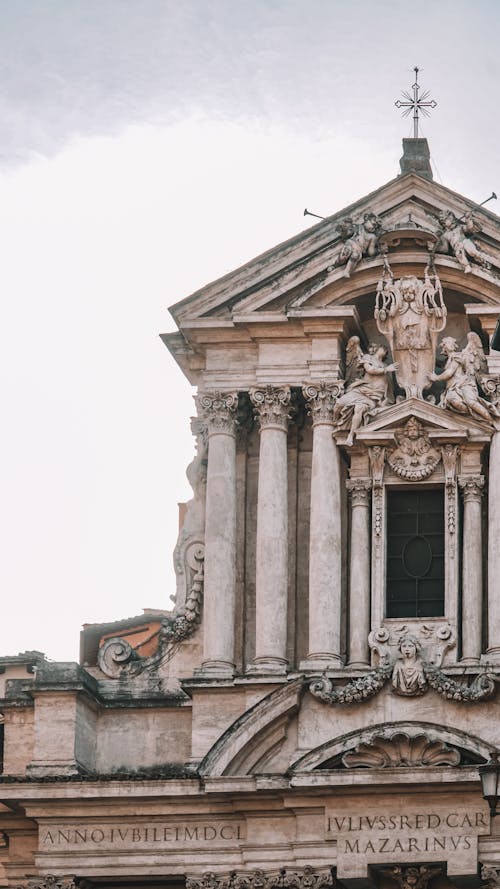 A close up of a building with a clock on it