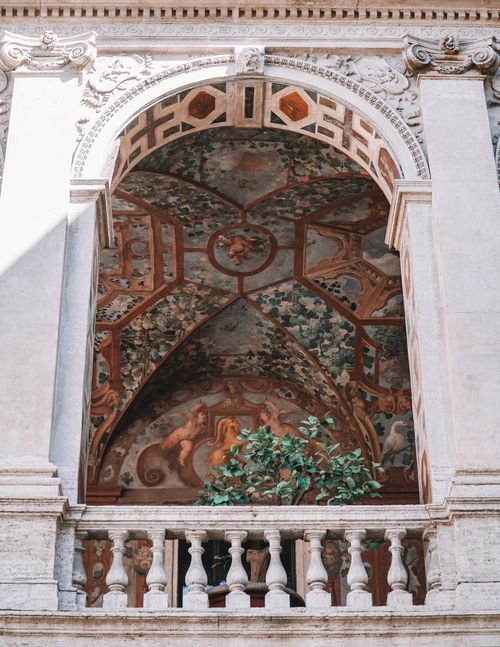 Free Explore the ornate arch and elegant frescoes at Palazzo Altemps, a historic location in Rome. Stock Photo
