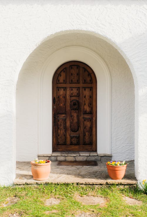 Foto profissional grátis de arcadas, casa, casas