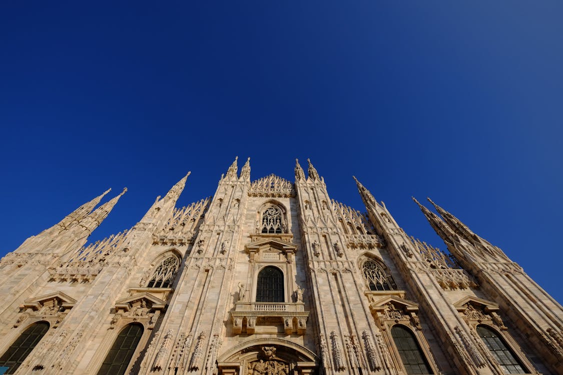 The Milan Cathedral is an iconic landmark in Italy featuring a great architectural style | Photo by Francesco Ungaro from Pexels