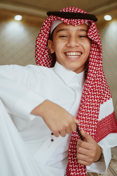 Free Smiling Boy in Traditional Clothing Stock Photo