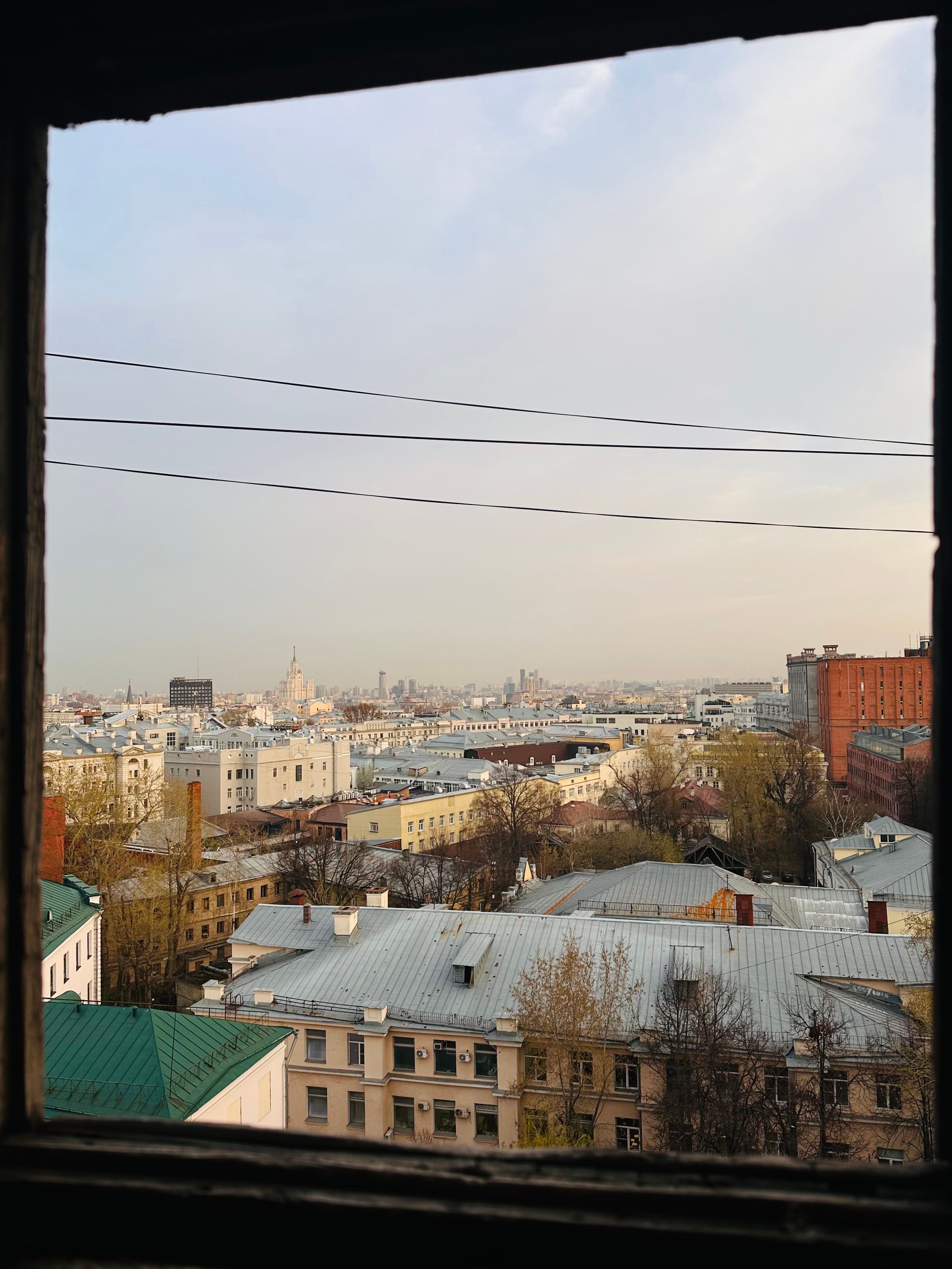 City Buildings behind Window · Free Stock Photo