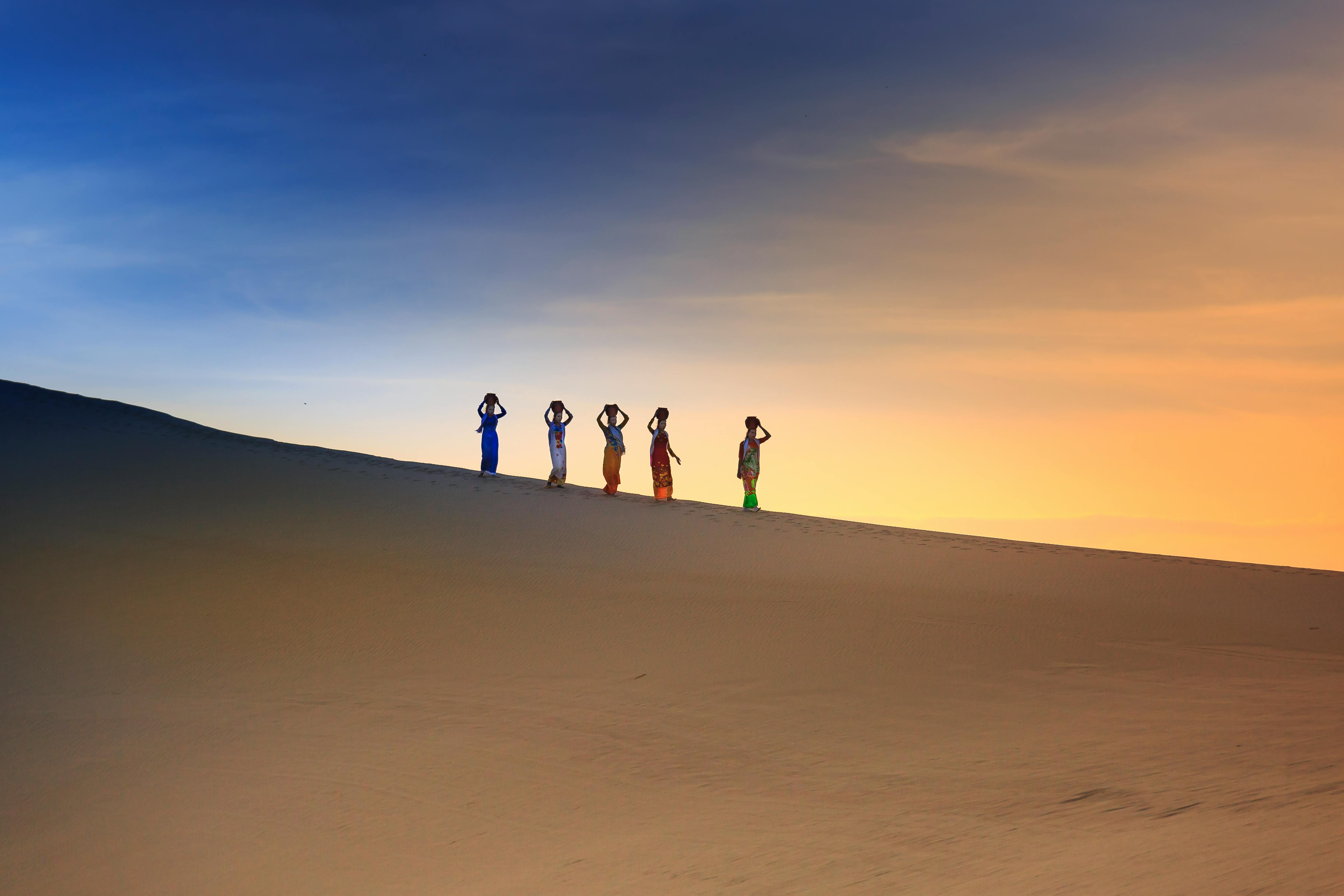 five people on desert