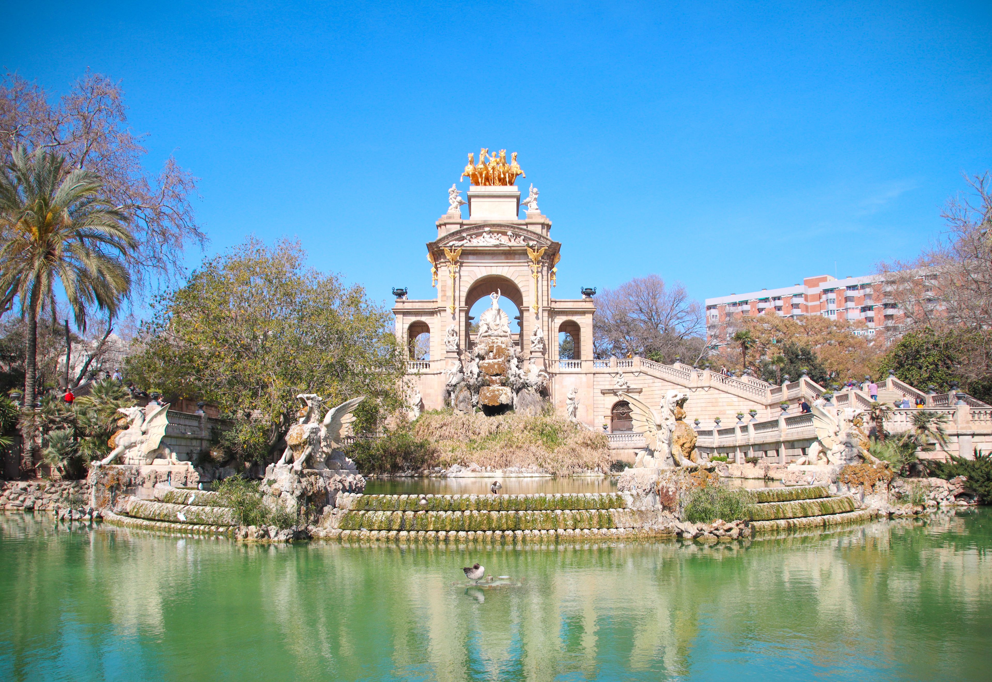 Family in Parc de la Ciutadella near El Born, Barcelona, with the Cascada fountain