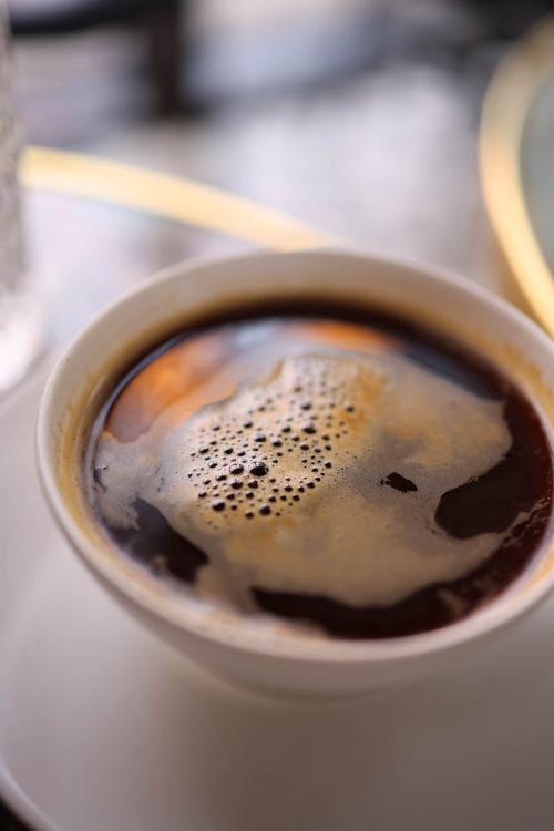 Free A steaming cup of espresso with rich crema, perfect for coffee lovers. Stock Photo