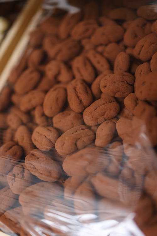 A close up of chocolate covered nuts