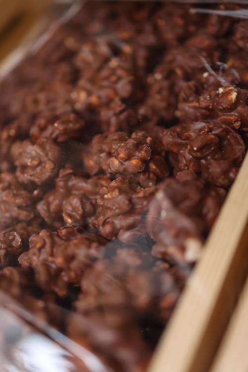 Free Chocolate covered popcorn in a wooden box Stock Photo