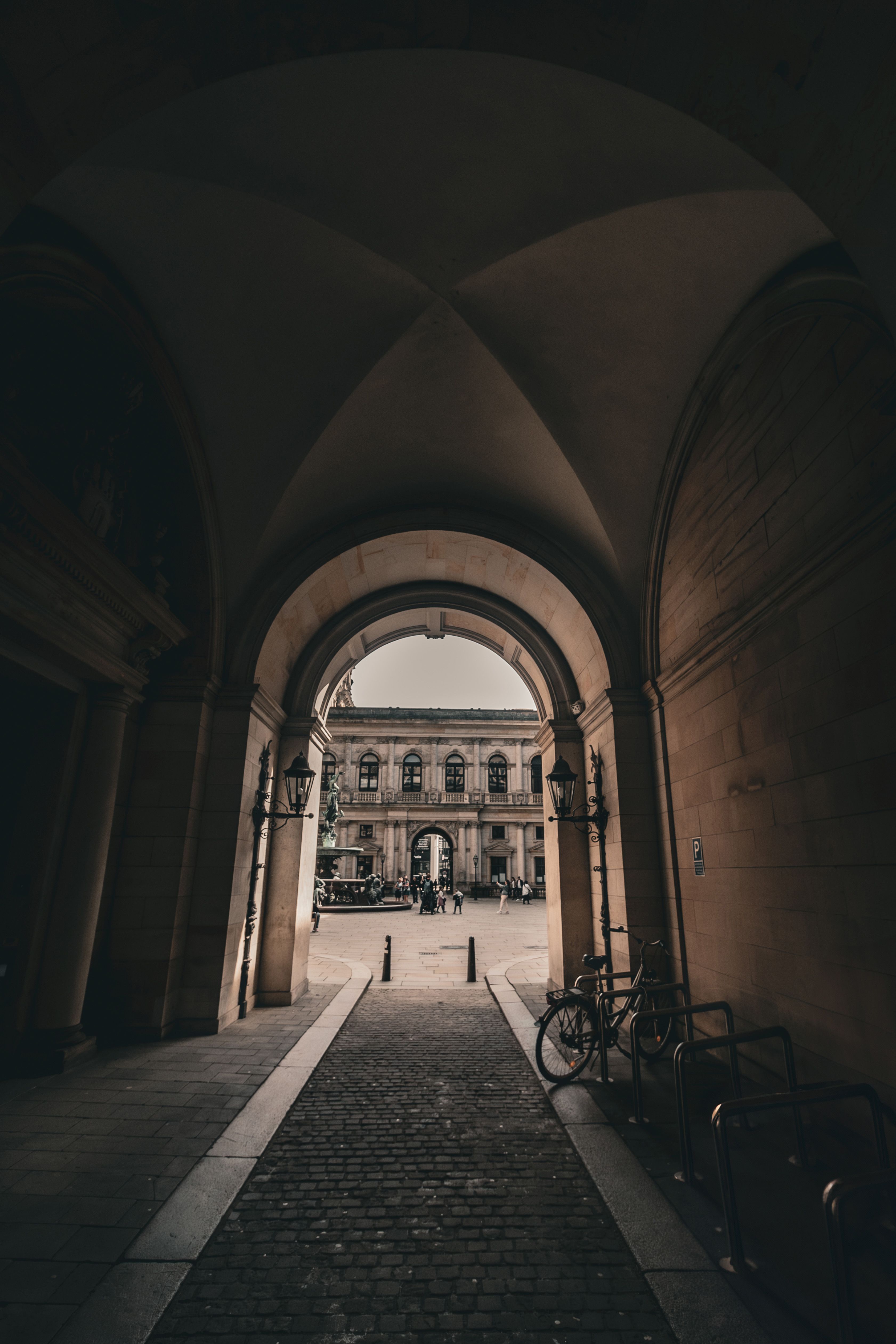 Symmetrical View of an Arch and a Courtyard · Free Stock Photo