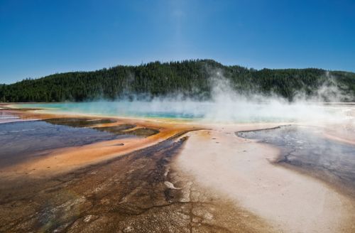 Free Breathtaking view of Grand Prismatic Spring in Yellowstone, showcasing vibrant colors and steam. Stock Photo
