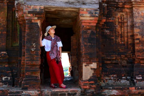 Photo Of Woman Standing In An Alley