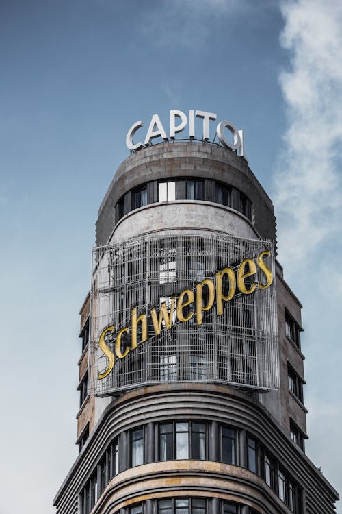 A tall building with the word capit on it