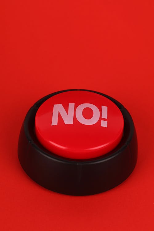 A red button with the word no on it