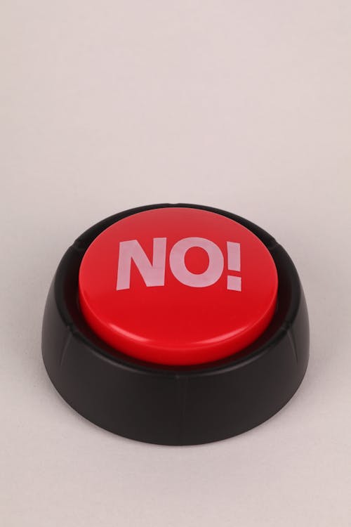 A red button with the word no on it