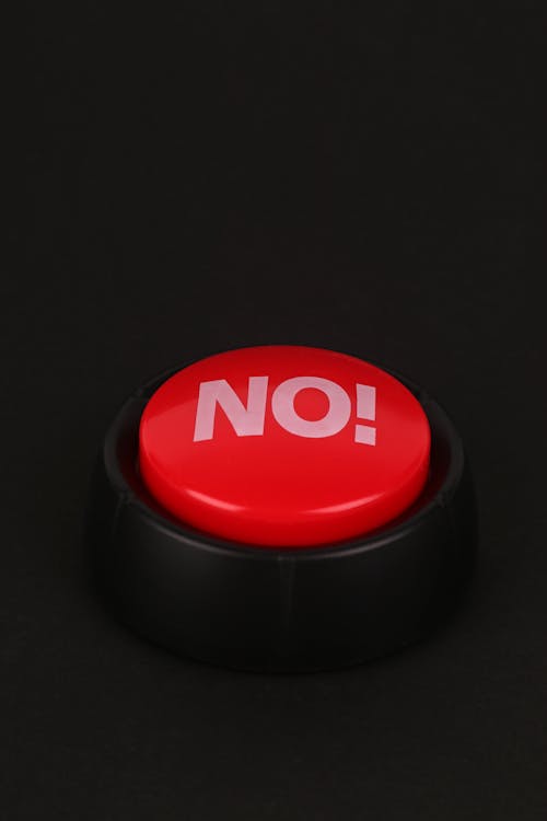 A red button with the word no on it