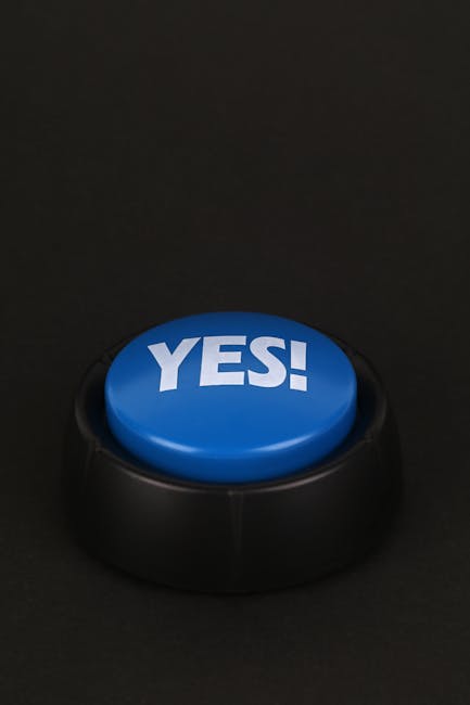 A blue button with 'YES!' text on a black background for communication and decision-making concepts.