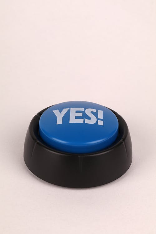 Free A blue button with the word yes on it Stock Photo