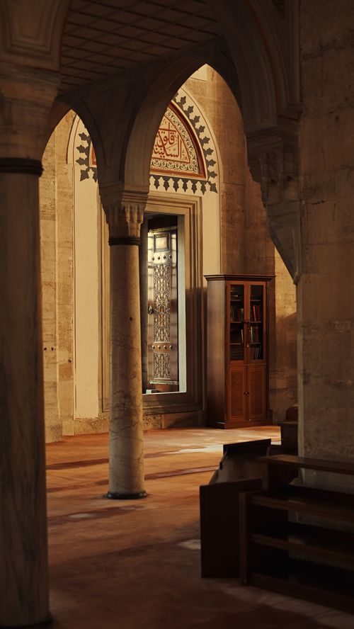 Free Interior view of a mosque with arches and columns, reflecting Islamic architectural beauty and history. Stock Photo