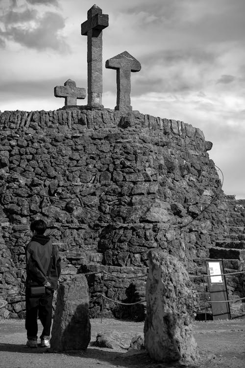 Tourist at Turo de les Tres Creus