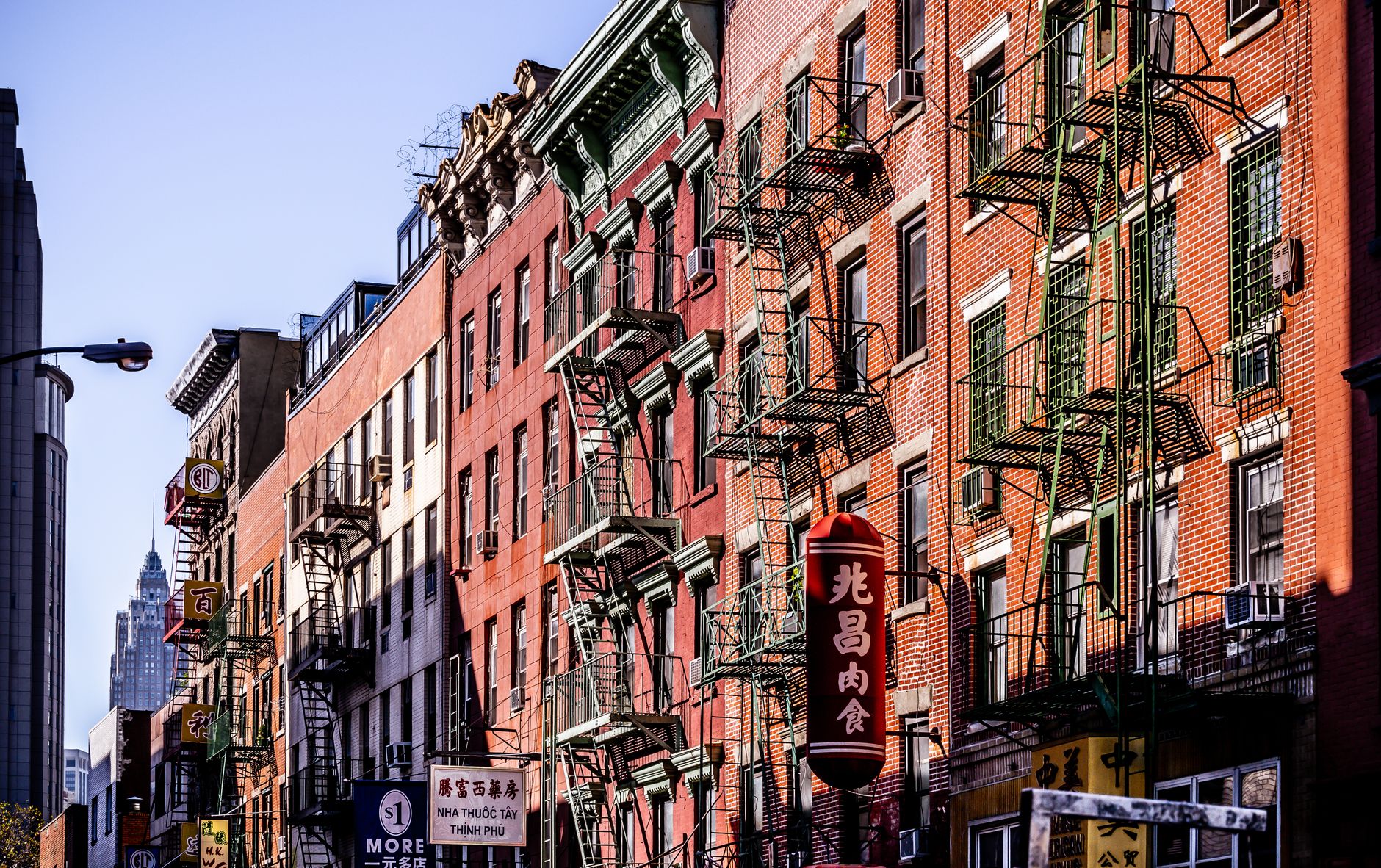 Colorful fire escape lined buildings in New York City
