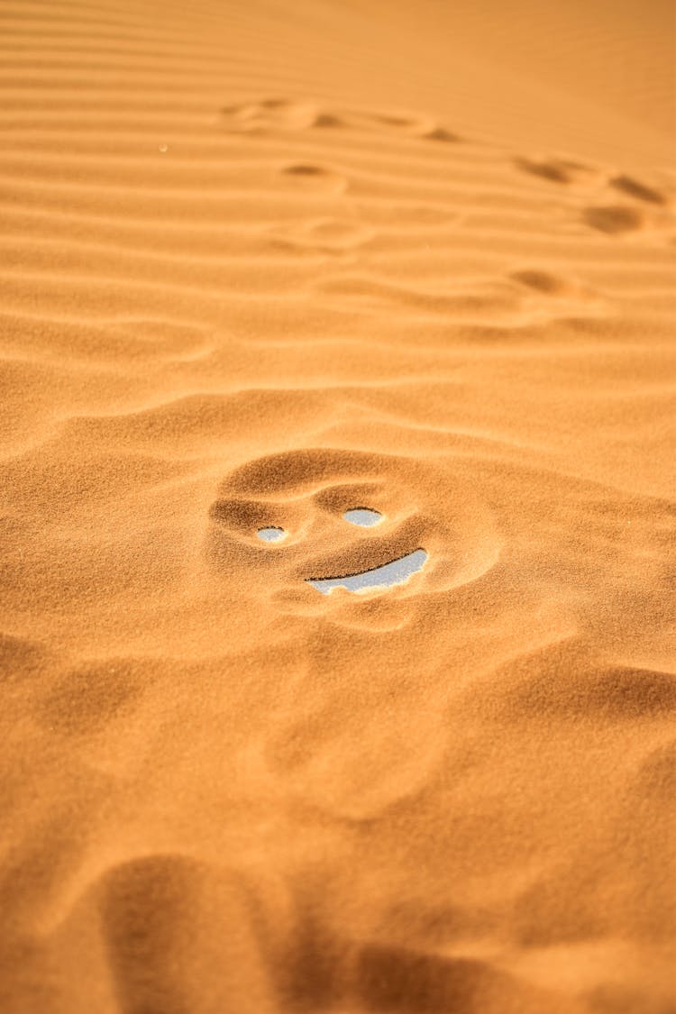 Smiley Face On Sand