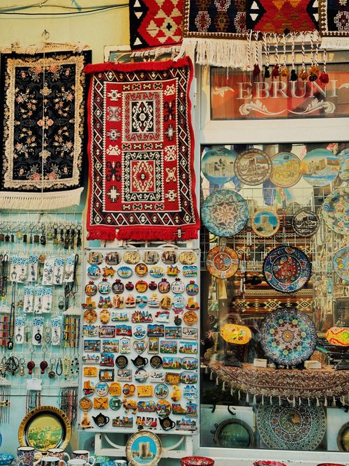 Free Vibrant display of traditional Azerbaijani souvenirs and decorations in a Baku bazaar. Stock Photo