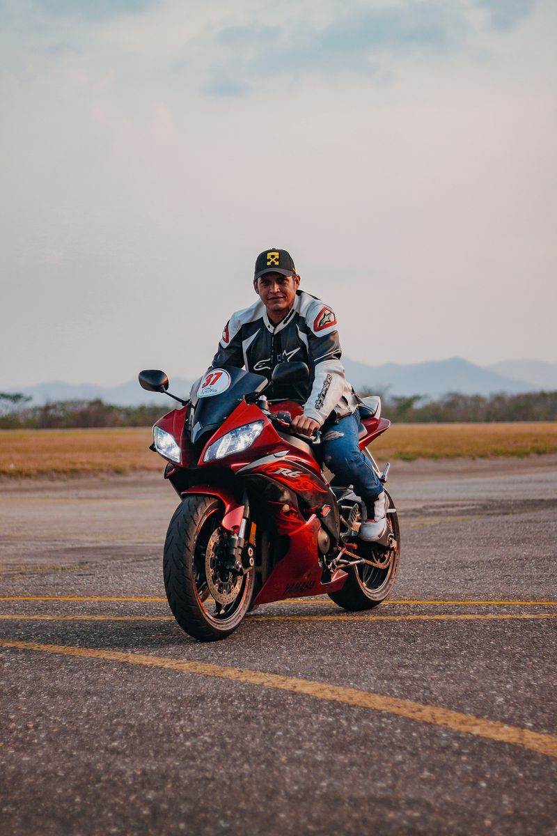 Man Riding a Motorcycle on One Wheel · Free Stock Photo