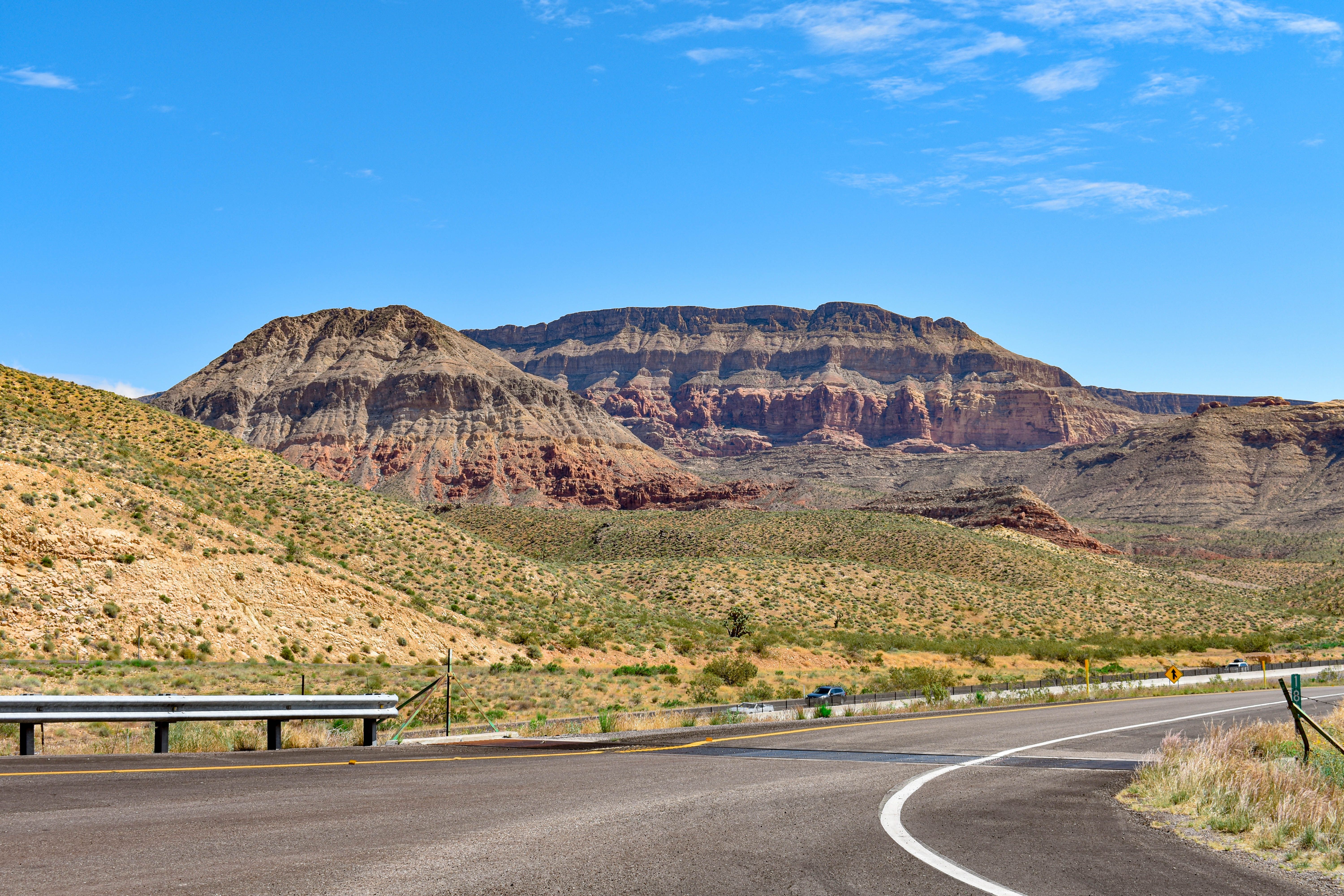 Rock Formation on Hill over Road · Free Stock Photo
