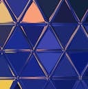 抽象几何图案采用充满活力的蓝色三角形和马赛克设计