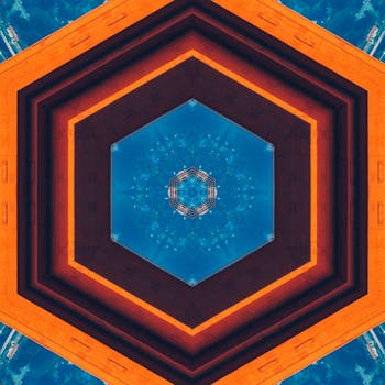 这款以蓝色和橙色为主色调的抽象六边形万花筒图案，充满活力，非常适合现代艺术装饰
