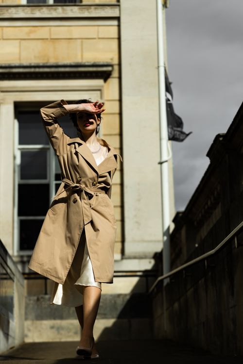 Woman wearing a trench coat