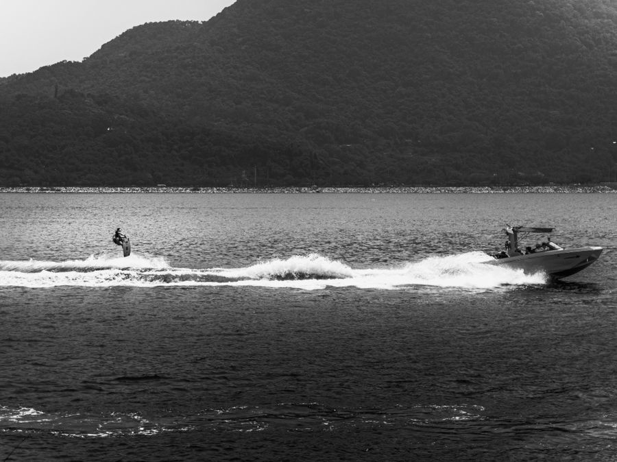 Wakesurfer riding behind a motorboat