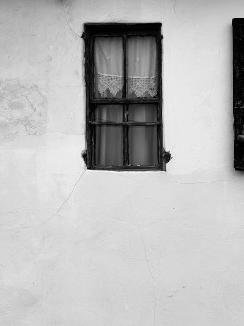 Free Black and white photograph of a window with shutters Stock Photo