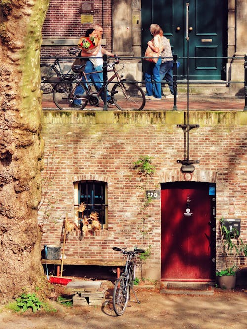 Fotobanka s bezplatnými fotkami na tému Amsterdam, bicykle, ľudia