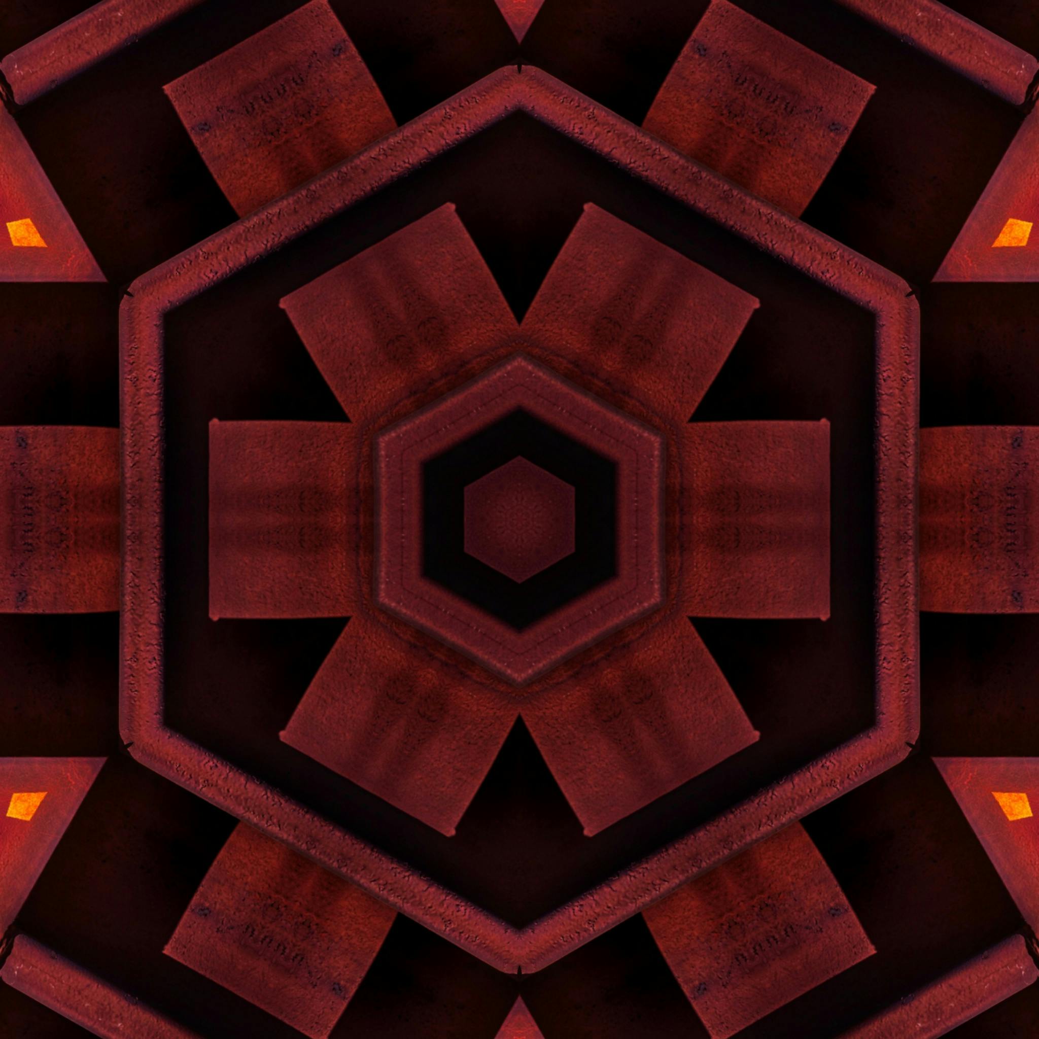 这是一幅充满活力的几何抽象艺术作品，以温暖的色调呈现六边形万花筒图案